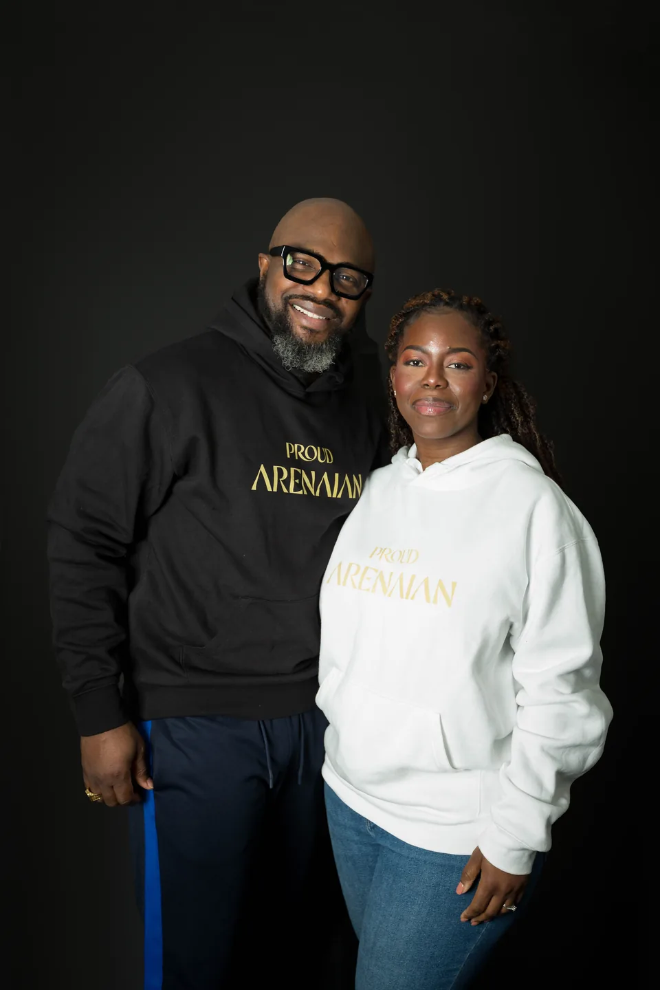 Pastor Allen and Pastor Joyce Caiquo together in Encounter Arena hoodies